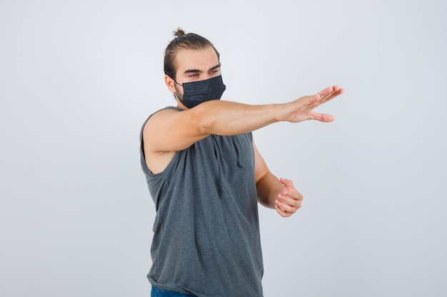 Close up on young man gesturing isolated