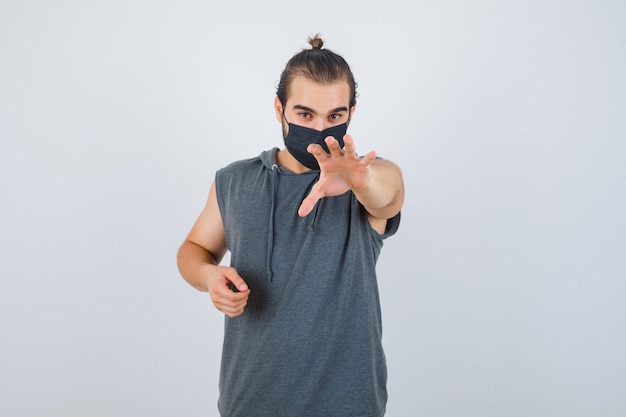 Close up on young man gesturing isolated