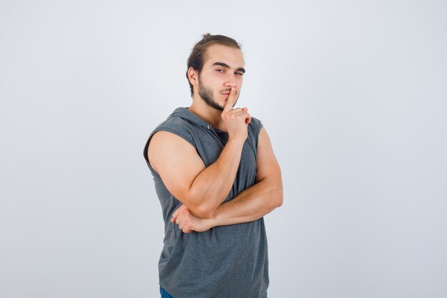 Close up on young man gesturing isolated