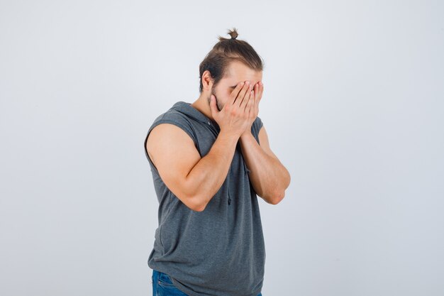 Close up on young man gesturing isolated