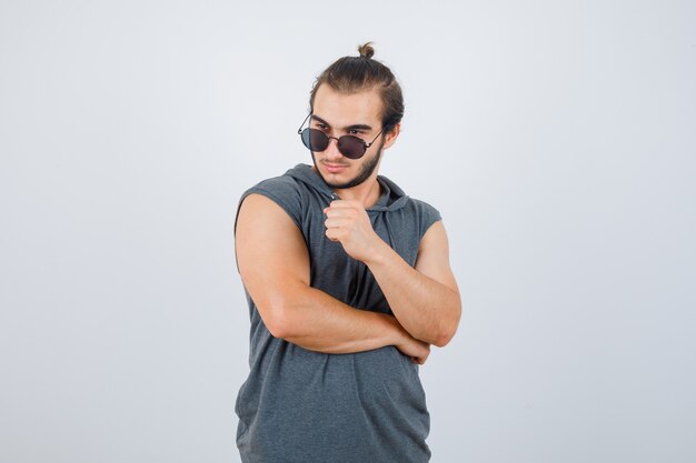 Close up on young man gesturing isolated