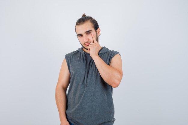 Close up on young man gesturing isolated