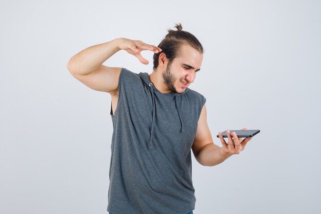 Close up on young man gesturing isolated