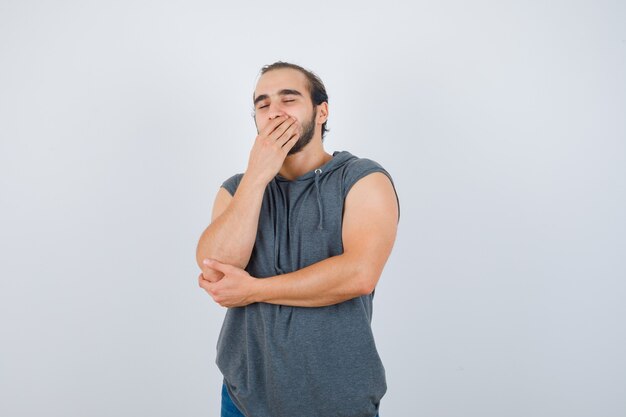 Close up on young man gesturing isolated