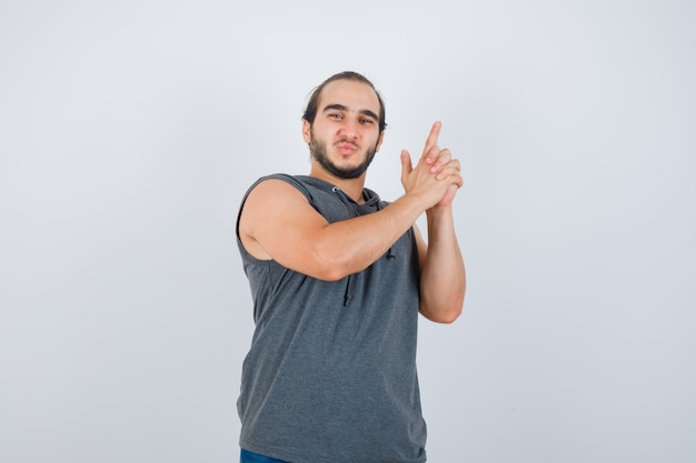 Close up on young man gesturing isolated