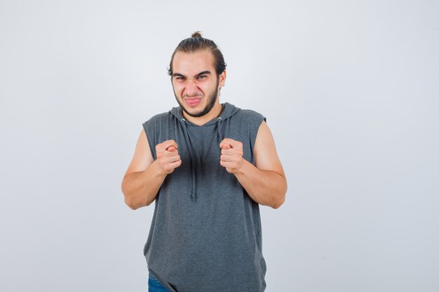 Close up on young man gesturing isolated