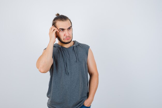 Close up on young man gesturing isolated