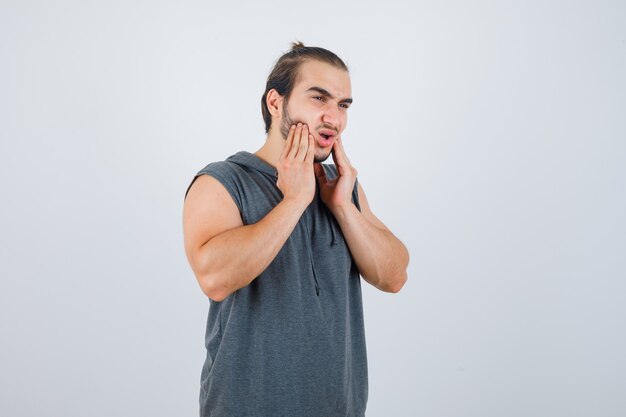 Close up on young man gesturing isolated