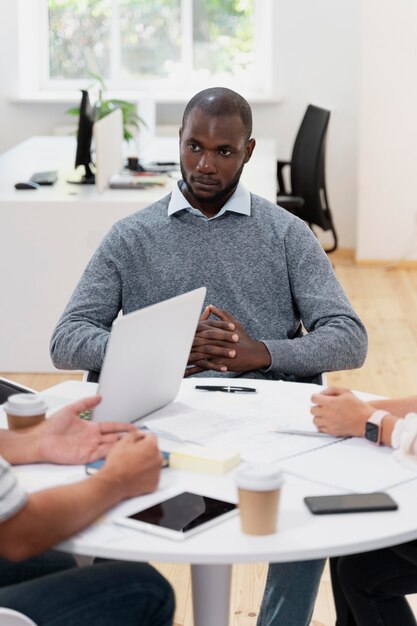 Close up on young man having a meeting