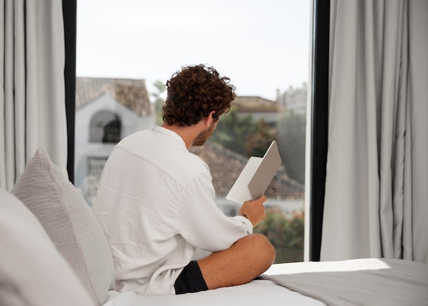 Close up on young man in luxury travel house