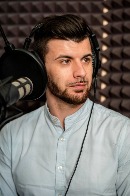 Close-up young man at radio