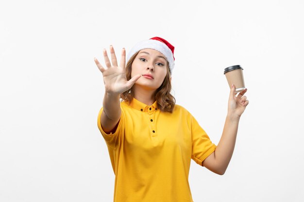 Close up on young pretty woman wearing Christmas hat isolated