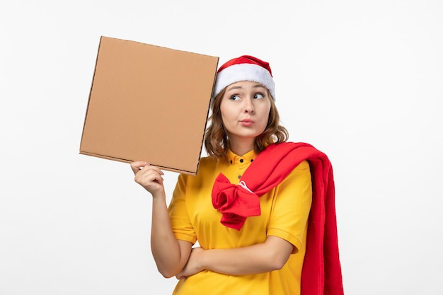 Close up on young pretty woman wearing Christmas hat isolated