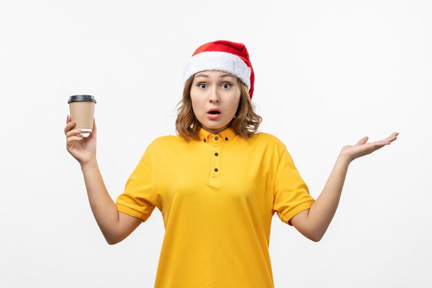 Close up on young pretty woman wearing Christmas hat isolated