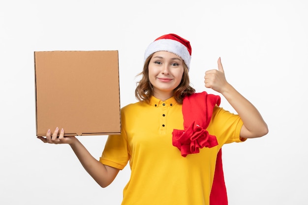 Close up on young pretty woman wearing Christmas hat isolated