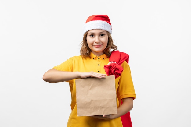 Close up on young pretty woman wearing Christmas hat isolated