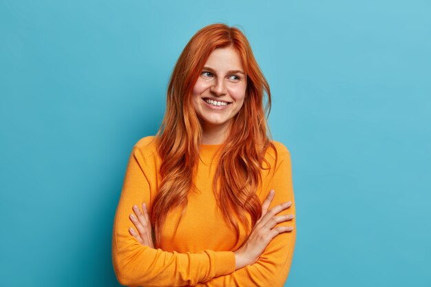 Close up on young redhead woman gesturing