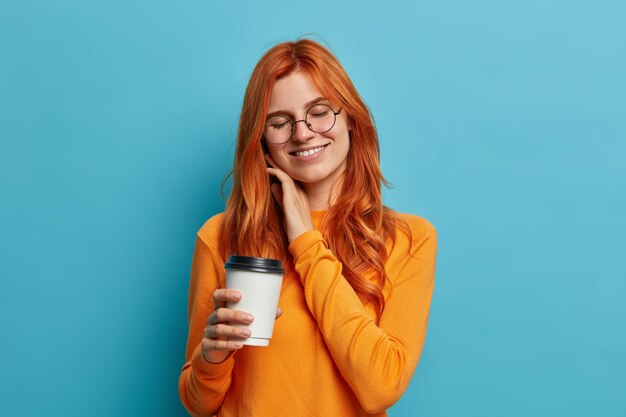 Close up on young redhead woman gesturing