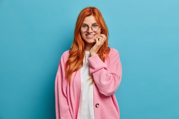 Close up on young redhead woman gesturing