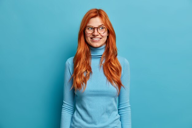 Close up on young redhead woman gesturing