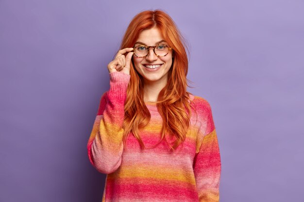 Close up on young redhead woman gesturing