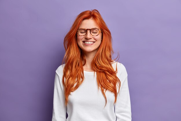 Close up on young redhead woman gesturing