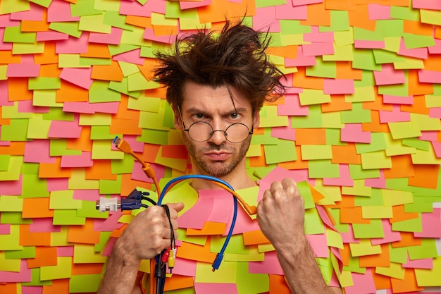 Free photo close up on young student surrounded by sticky notes