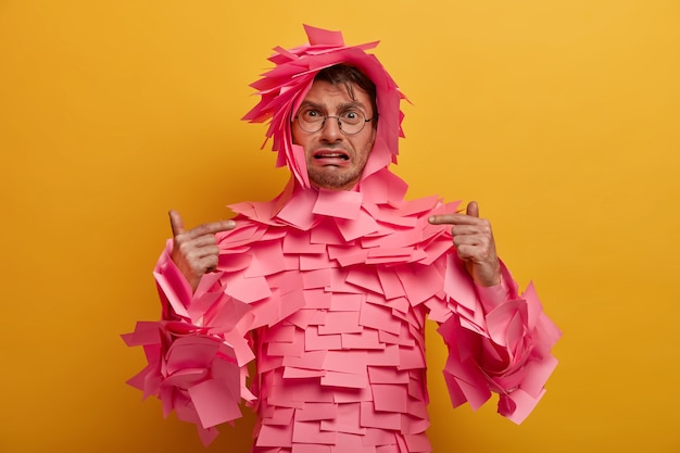 Free photo close up on young student surrounded by sticky notes