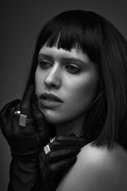 Close up young woman posing black and white