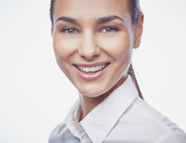 Close-up of young woman smiling