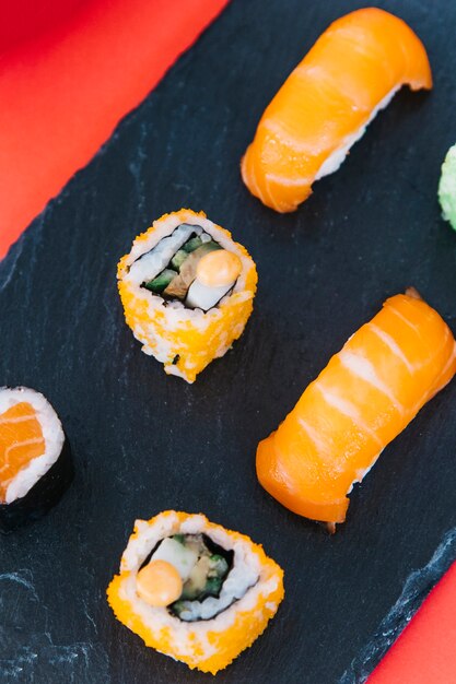 Close-up yummy sushi on board