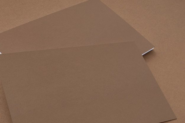 Close view of carton paper business cards on cardboard background