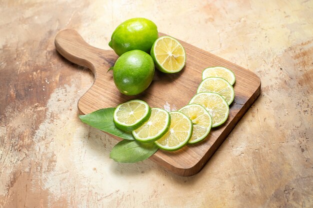 Close view of chopped and cut whole fresh limes