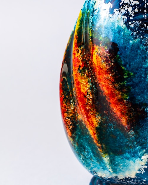 Close view side of a chocolate egg multi colored coloring