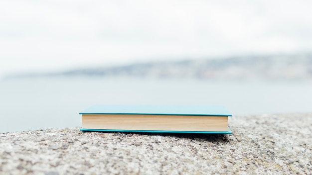 Closed book near the sea