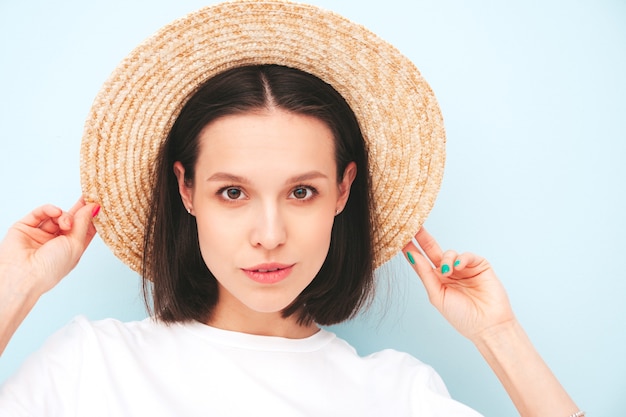 Closeup beauty portrait of young beautiful smiling female in trendy summer hipster clothes