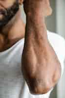 Free photo closeup of black person's arm