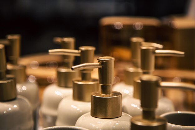 Closeup bottles with dispensers for liquid soap