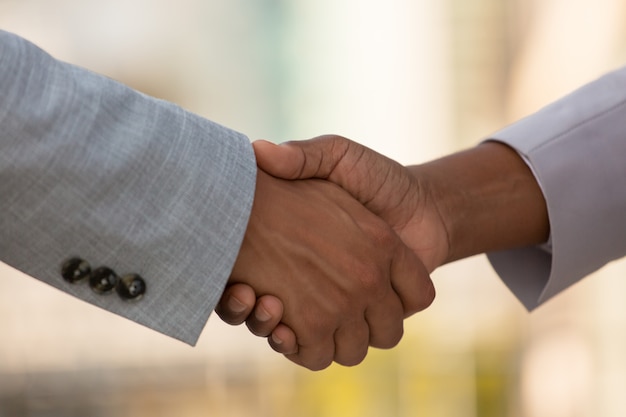 Closeup of business colleagues handshake