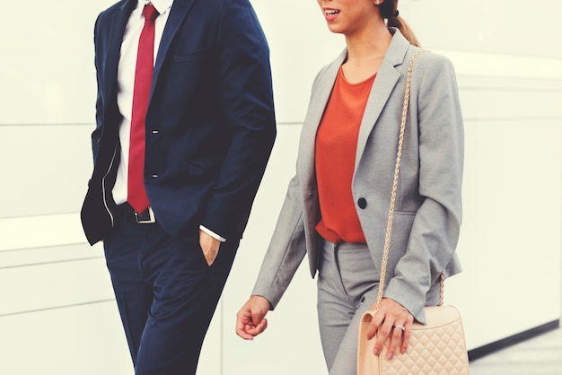 Closeup of business people walking together