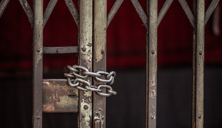 Free Photo closeup of chained sliding grille door