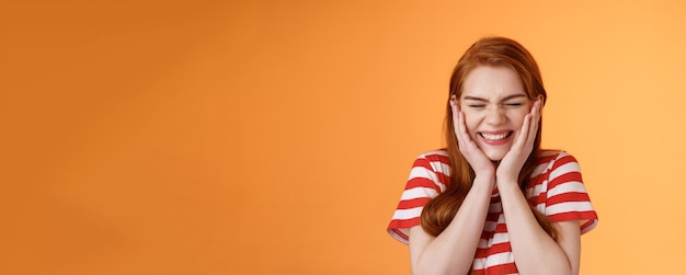 Closeup cheerful lucky excited smiling girl cannot believe cheering hear excellent news close eyes c