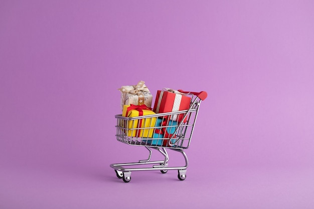 Free photo closeup of colorful gift boxes in a trolley