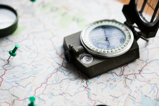 Closeup of compass on the map