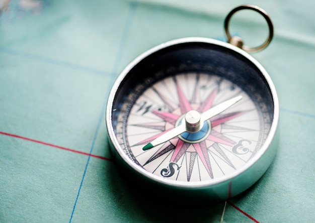 Closeup of compass on the map