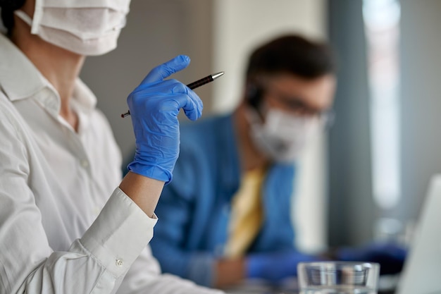 Free photo closeup of customer service representative working at call center during virus epidemic