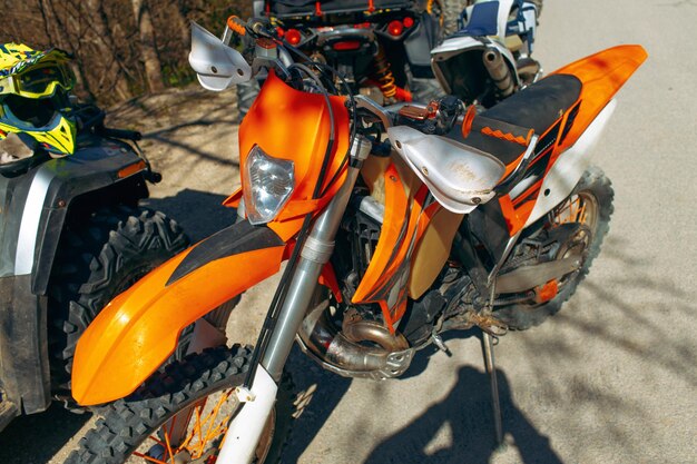 Closeup details of cross motorcycle parked on ground