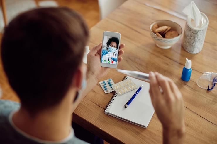 Free Photo closeup of doctor advising her patient about medicines via video call during coronavirus pandemic