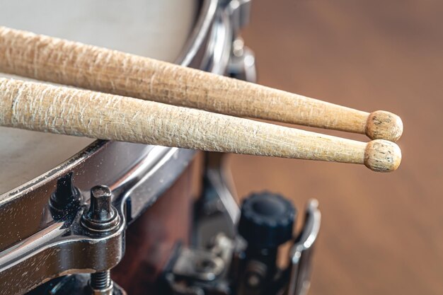 Closeup drumsticks on a blurred background