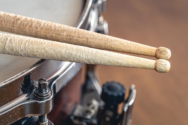 Closeup drumsticks on a blurred background